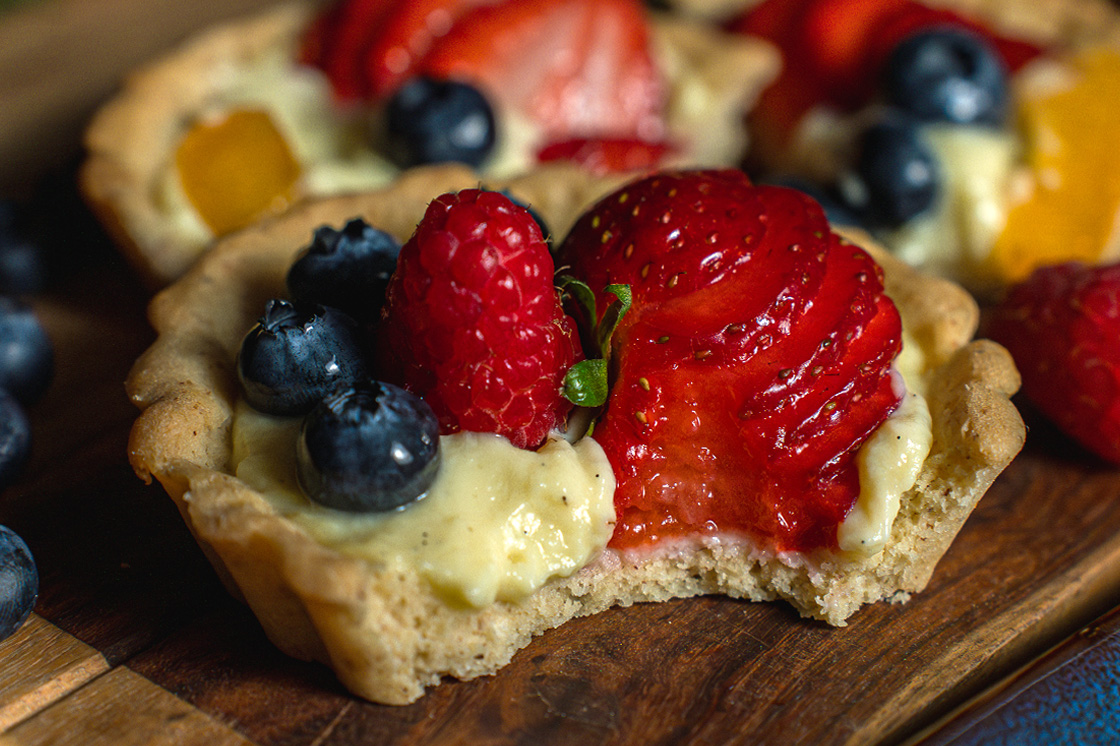 Bite into a fresh fruit tartlet